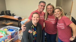 Group of OneAmerica associates celebrating community success